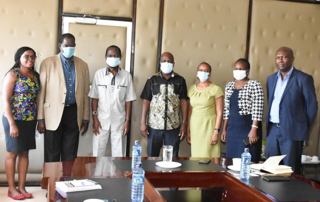 Kisumu Governor H.E. Prof Anyang Nyong’o (3rd Left), Commissioner Eng. Philip Okundi (2nd left), representatives from FHI360 and other dignitaries pose for a group photo during a courtesy call to the Governor’s office in Kisumu on 3rd September, 2020